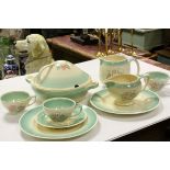 A comprehensive Susie Cooper Dresden pattern tea and dinner service to include tureens, jugs, cups