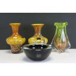 A 1960s/70s retro iridescent bowl, a yellow vase and a pair of Makora art glass vases.