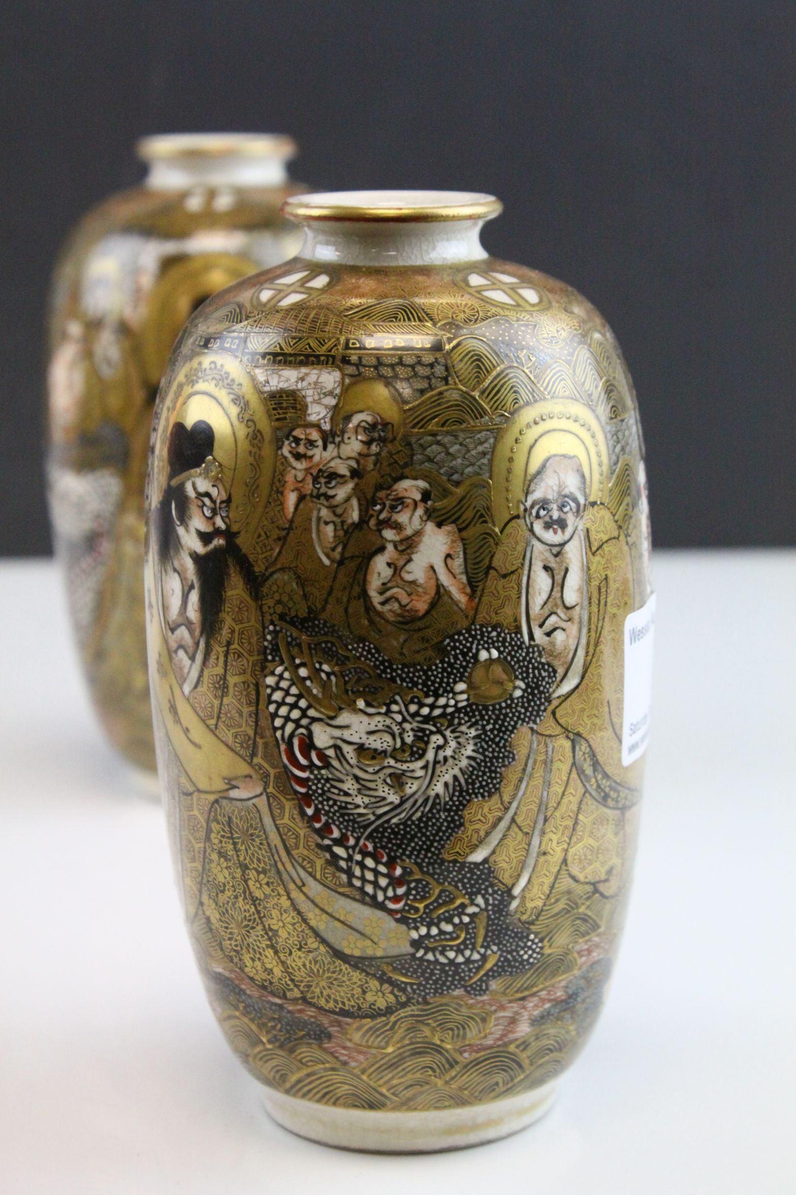 Pair of Japanese Meiji Period Satsuma Vases decorated with Immortals and Dragons, seal marks to - Image 2 of 6