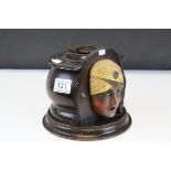 Wooden Cigarette Dispenser in the form of a Girl in a Turban by Kindel and Graham