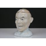 Ceramic Lidded Jar in the form of a Chinese Man, 17cms high