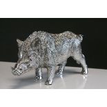 A large figure of a silver effect cultured truffle boar