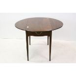 19th century Mahogany Oval Drop Flap Table with Drawer and Faux Drawer, raised on square tapering