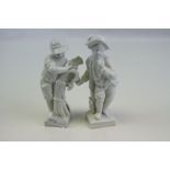 A pair of blanc de chine ceramic figures depicting young boys.