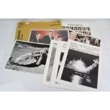 A collection of NASA ephemra to include NASA fact magazines and a selection of photographs.