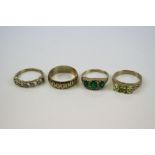 Four 9ct gold ladies rings to include a wedding band.