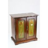 Early 20th century Art Nouveau Mahogany Table Top Smokers Cabinet, the two panel doors with inlaid