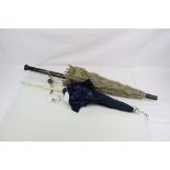 A 19th century carved ivory carriage parasol, the hinged folding handle carved with chains and a