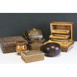 Three carved sandal wood boxes, a hardwood screw top pot, two cigarette dispensers and a boxwood