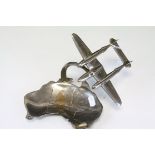 White Metal Model of a World War II Fighter Plane suspended on an Australia shaped dish dated 1946
