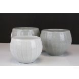 Three Studio Pottery Ribbed Bowls with A mark. largest 11.5cms high