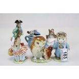 Two Beswick Beatrix Potter Figures with circular gold backstamps being Tom Kitten and Miss