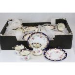 Paragon China part Tea Set decorated with flowers and blue / gilt rims, approx. 38 pieces, made in