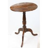 George III Walnut Circular Tilt Top Table on pedestal base with three splay feet, 49cms diameter