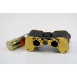 A pair of vintage Carl Zeiss Jena Teleator 3x Pocket Binoculars together with a small bottle in