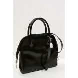 Salvatore Ferragamo black patent leather handbag with handles and shoulder strap