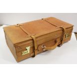 Tan leather suitcase, straps to exterior, number lock, gold coloured studs to base, stitching,