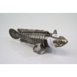 A White Metal Articulated Fish. Measures approx 155mm.