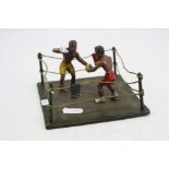 A Pugilist Cold painted bronze of two boxers within a boxing ring, Marked to the underside with