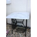 Square Marble Top Table set on a Singer Sewing Machine Treadle Base, 69cms wide x 71cms high