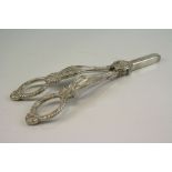 A fully hallmarked sterling silver pair of grape scissors, marked with an assay mark for