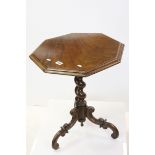 19th century Octagonal Table raised on a Barley-twist Pedestal Base with Three Scrolling Carved