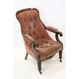 William IV mahogany open armchair, with button-back upholstery on turned legs
