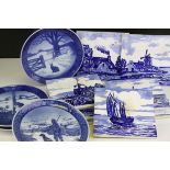 Ten Dutch Scene Blue and White Wall Tiles together with Four Royal Copenhagen Christmas Plates dated