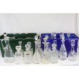 Collection of Twenty Glass Decanters and Stoppers, mostly cut glass together with Glass Claret Jug