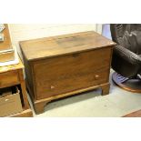 An antique walnut mule chest