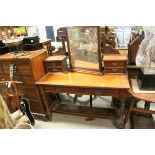 Edwardian Mahogany Dressing Table with Two Drawers raised on ringed turned legs, 121cms wide