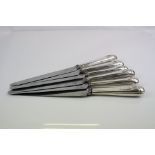 A set of six Victorian silver handled dinner knives, the blades marked Garrad, silver hallmarks