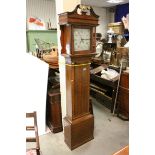 19th century Oak Longcase Clock, the hood with break swan neck pediment, the painted face with