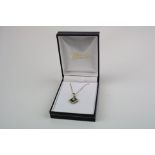 A 9ct gold with diamond and Sapphire Necklace and pendant set.