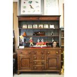 19th century Oak Dresser, the upper section with boarded shelves over an arrangement of six