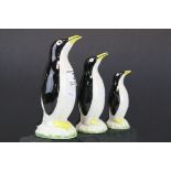 Set of Three Ceramic Graduating Models of Penguins, unmarked, tallest 15cms high