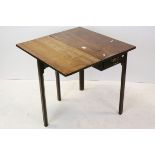 Early 19th century Mahogany Table with Single Drop Flap, drawer to one end, raised on square
