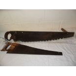 Two Vintage Hand Saws, one being 2 man wood saw