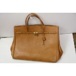 Large birkin style tan leather travel bag, leather interior, padlock clasp with key, width approx
