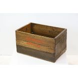 A vintage pine apple trug