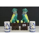 Pair of Oriental Green and Yellow Glazed Seated Dogs of Foe together with Pair of Oriental Hand