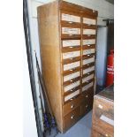 Mid 20th century Oak Haberdashery Cabinet with sixteen drawers glass fronted (presently covered) and