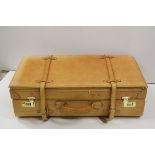 Tan leather suitcase, straps to exterior, number lock, gold coloured studs to base, stitching padded