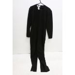 Gianfranco Ferre black wool jumpsuit, rounded neckline, long sleeves, two pleats/darts running