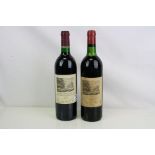 Two bottles of Chateau Duhart-Milon Rothchild wine, 1979 and 1993, 1979 bottle low on the neck.