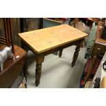 Pine bakery worktable on turned legs.