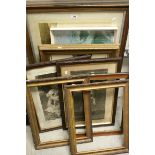 A group of framed prints to include Eric Tunney lion, an oak framed print of terriers chasing rabbit