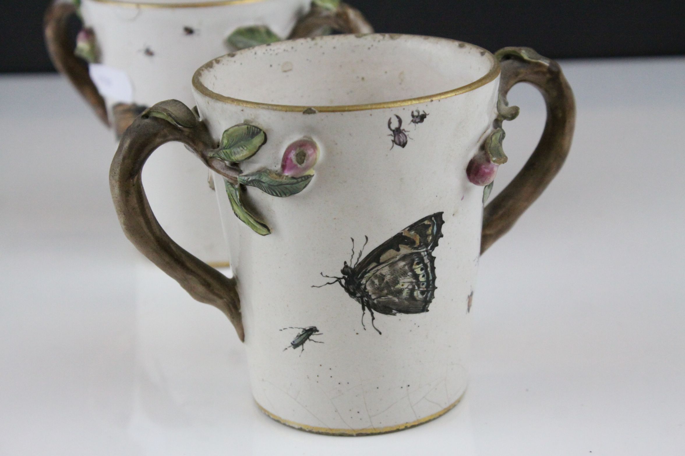 Pair of 19th century Continental Glazed Stoneware Twin Handled Mugs, the handles in the form of - Image 5 of 11