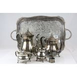 Silver Plated Four Piece Tea Service together with a Silver Plated Twin Handle Tray and a Napkin