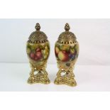 A pair of Royal Worcester pomander vases hand painted with fruit decoration by E. Townsend.